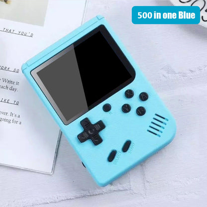 Blue handheld gaming console with screen and buttons on a white surface.
